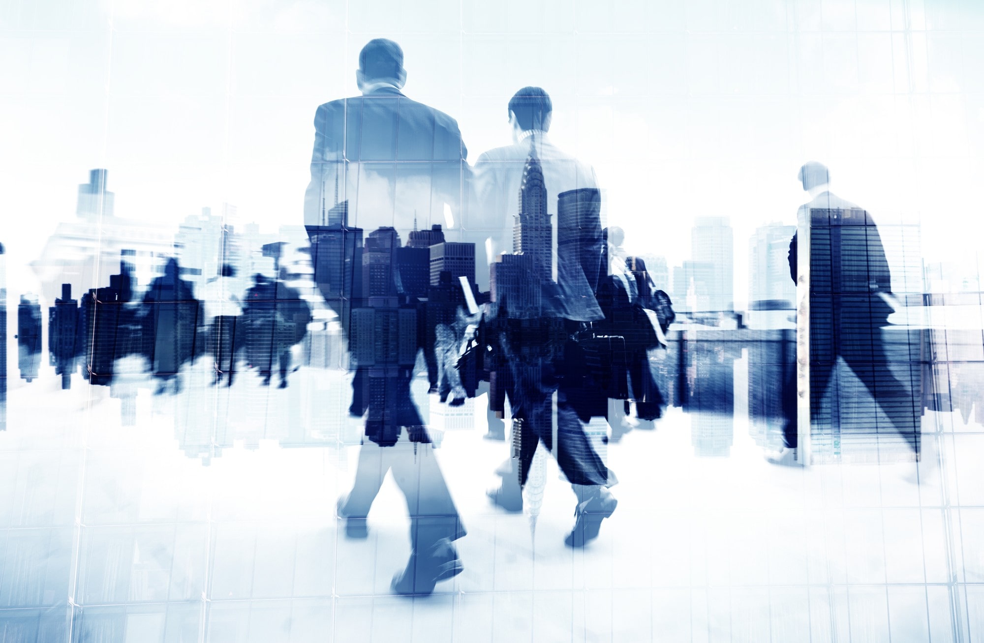 Diverse group of business people walking in a city
